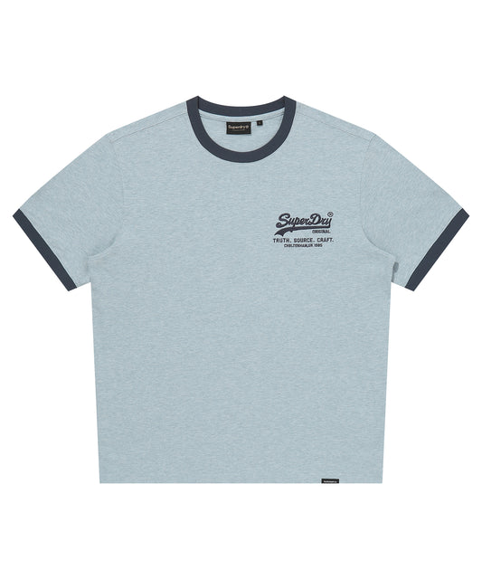 Light blue t-shirt with dark blue accents and a logo