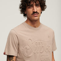 Embossed Archive Graphic T-Shirt - Deep Beige